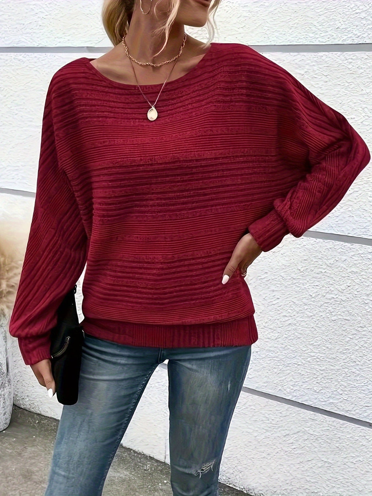 Maglione a coste da donna con maniche a pipistrello