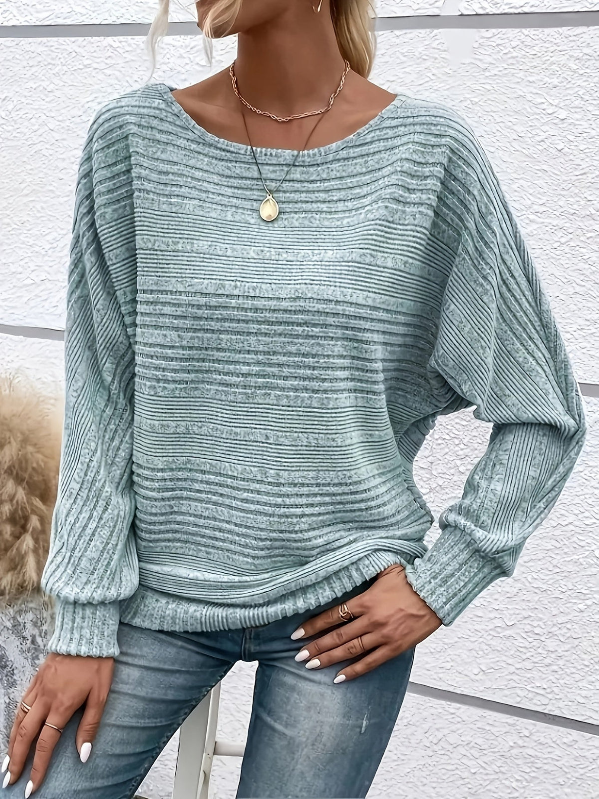 Maglione a coste da donna con maniche a pipistrello