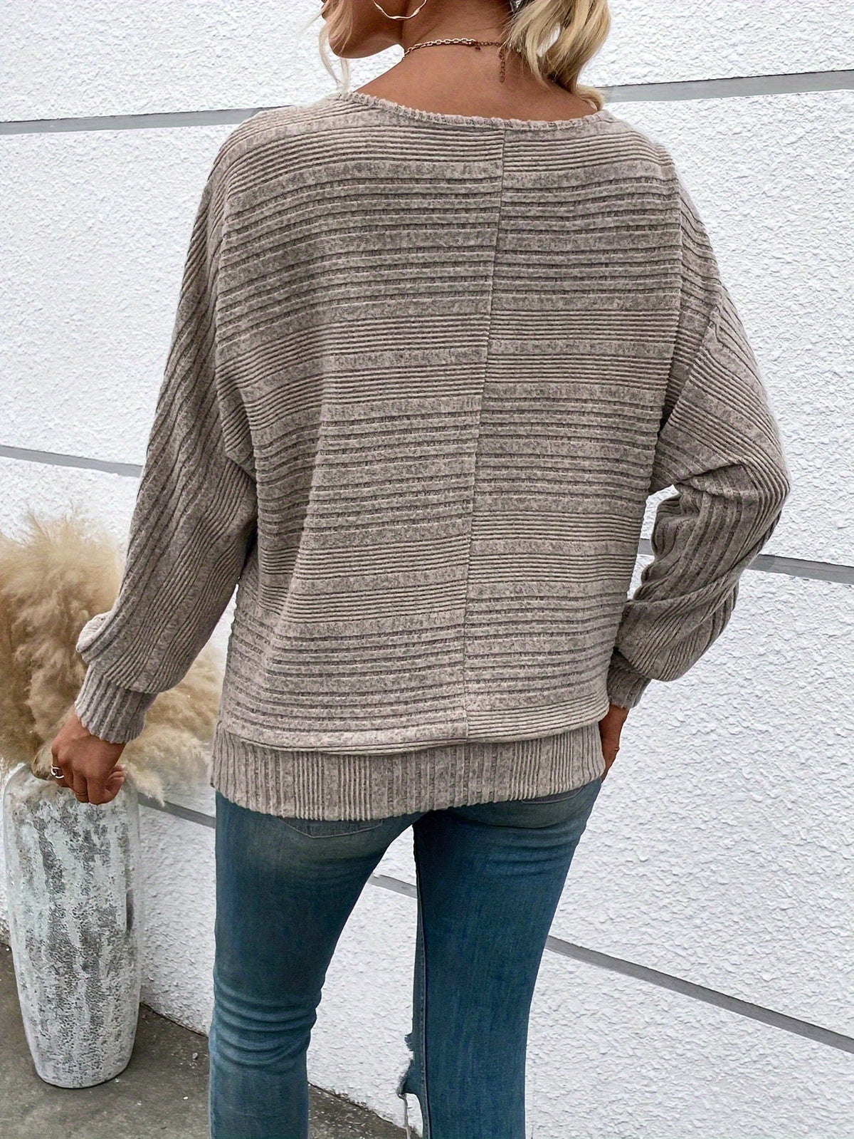 Maglione a coste da donna con maniche a pipistrello