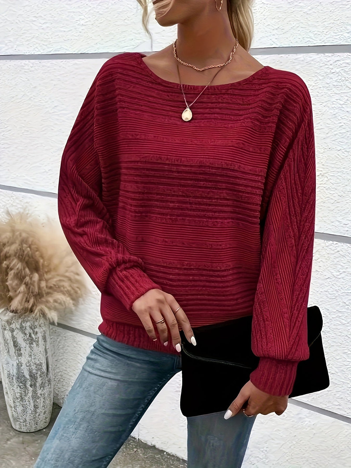 Maglione a coste da donna con maniche a pipistrello